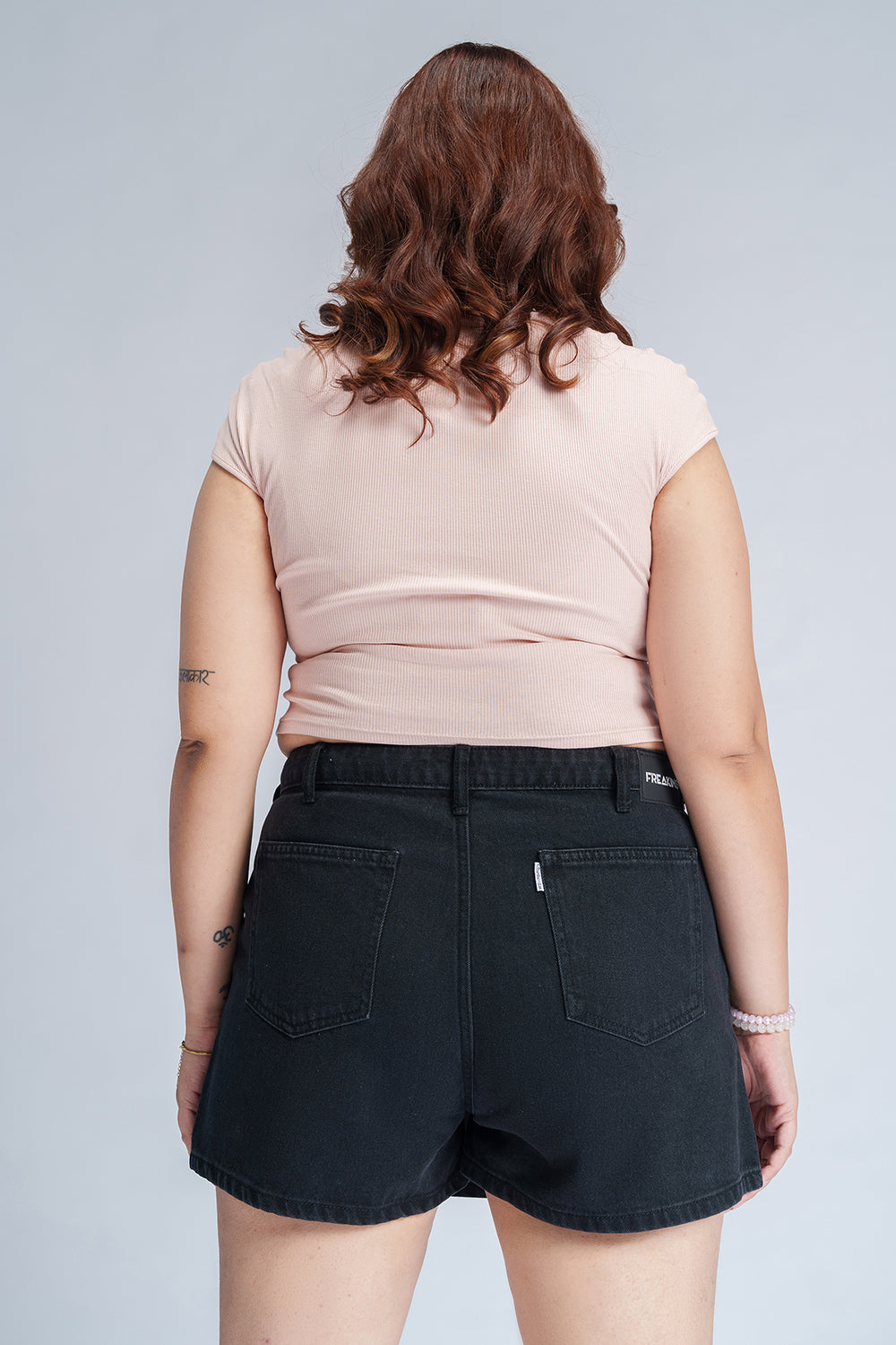 Dark Onyx Curve Asymmetric Waist Denim Skort
