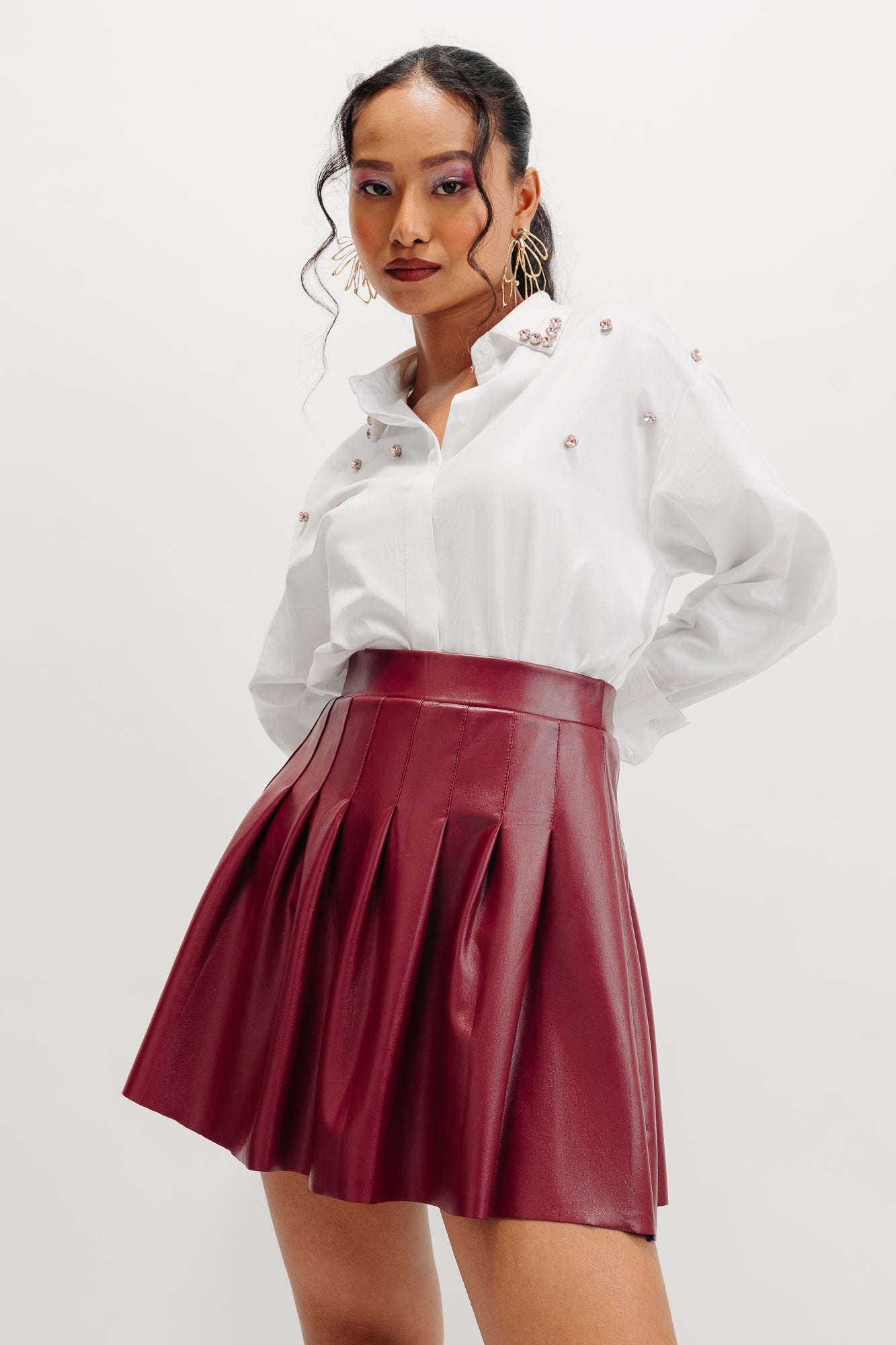 RED PLEATED LEATHER SKIRT