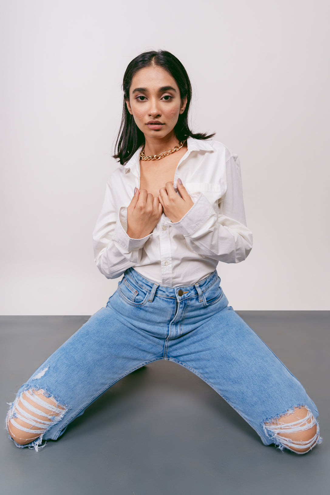 knee ripped slim fit jeans