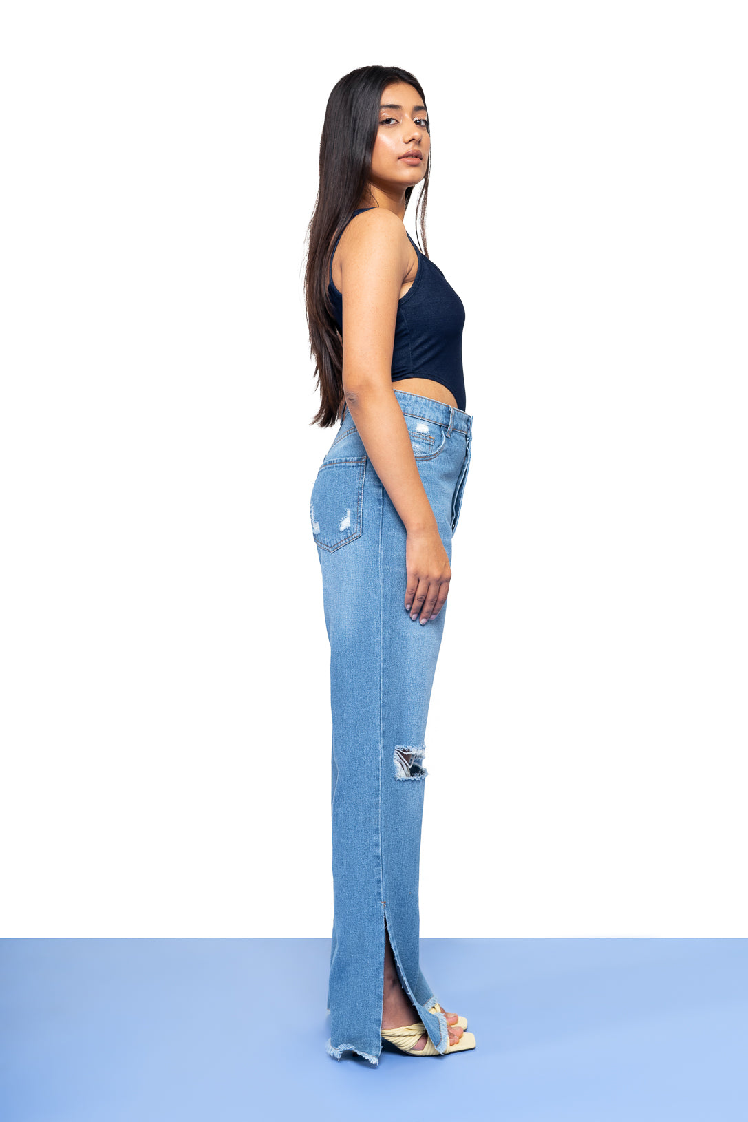 Distressed straight fit slit jeans