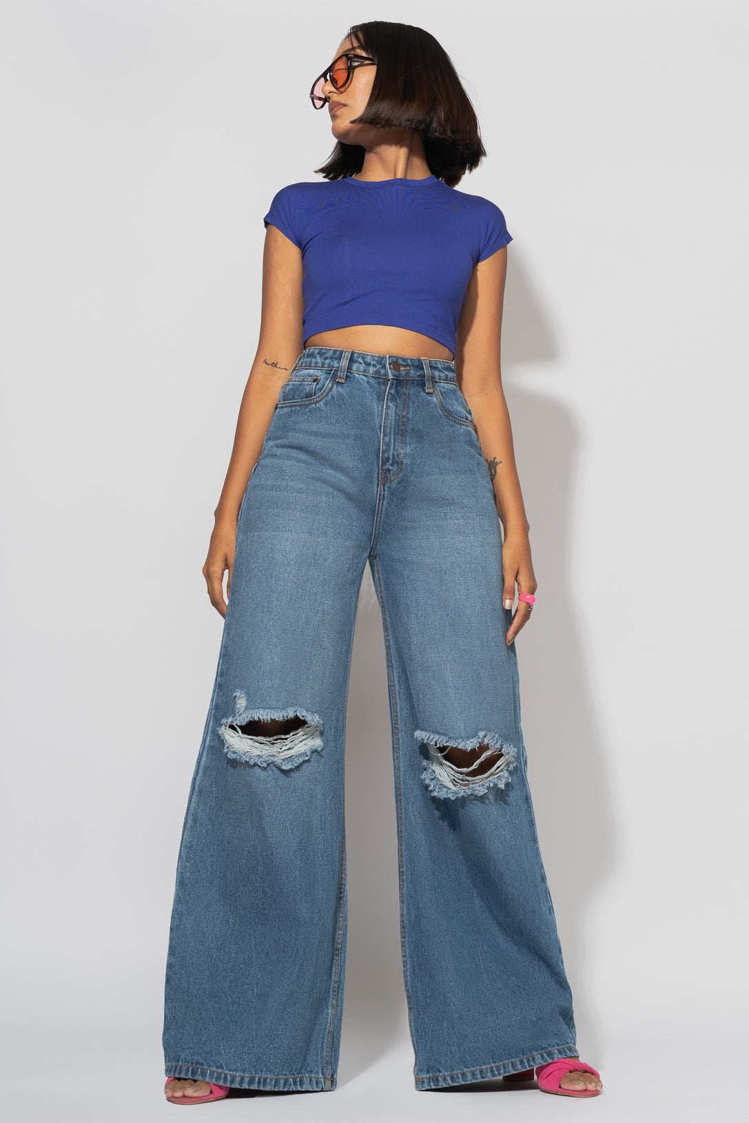 Super High Waisted Distressed Flare Jeans with Cut Outs