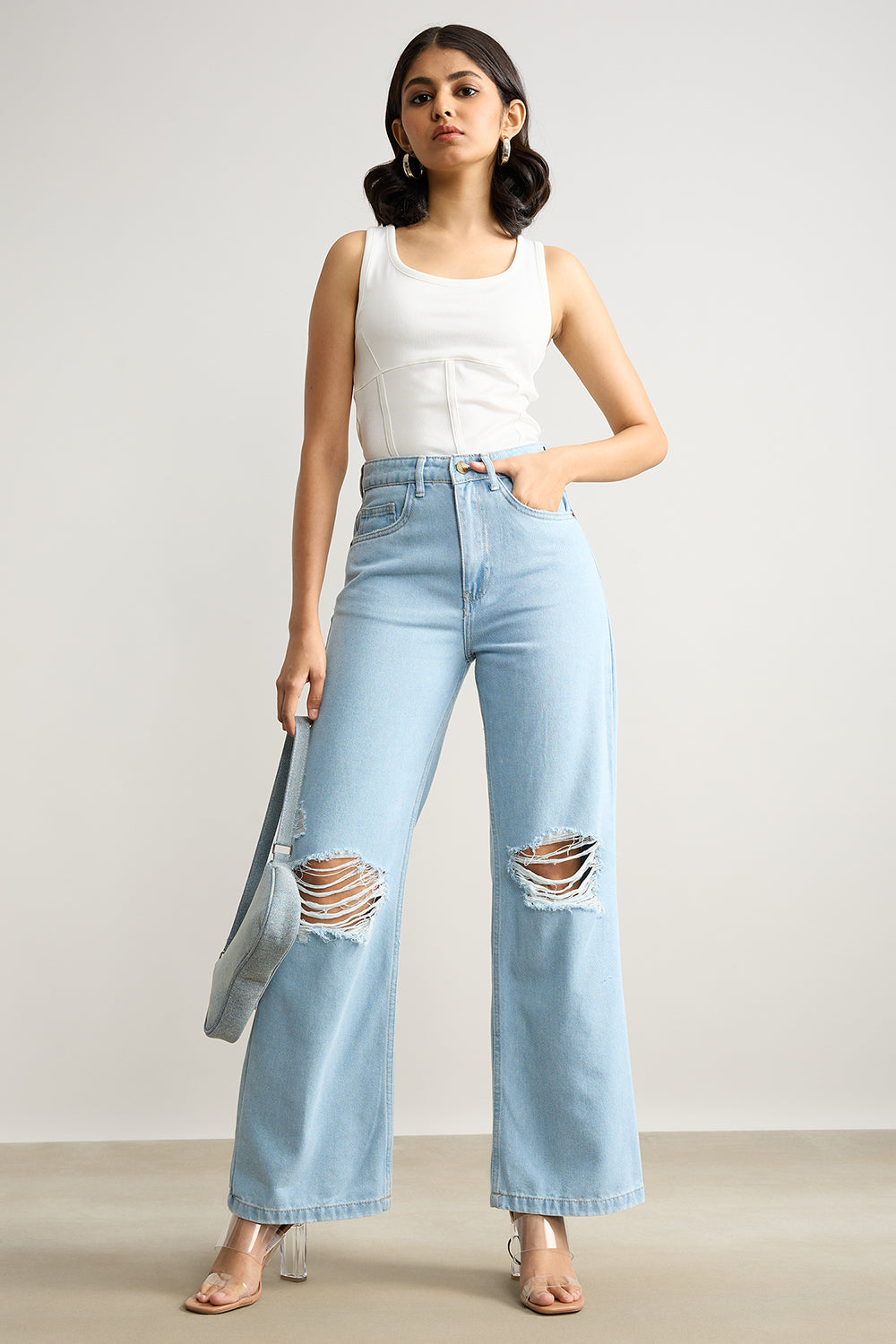 HIGH WAISTED DISTRESSED LIGHT BLUE JEANS