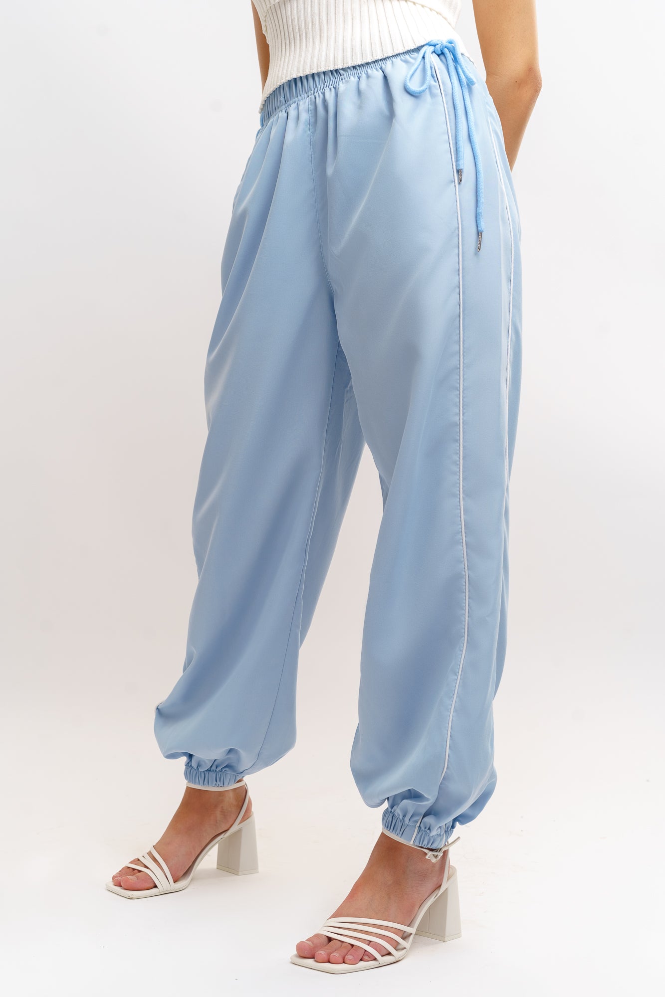 SKY SIDE PIPING JOGGERS