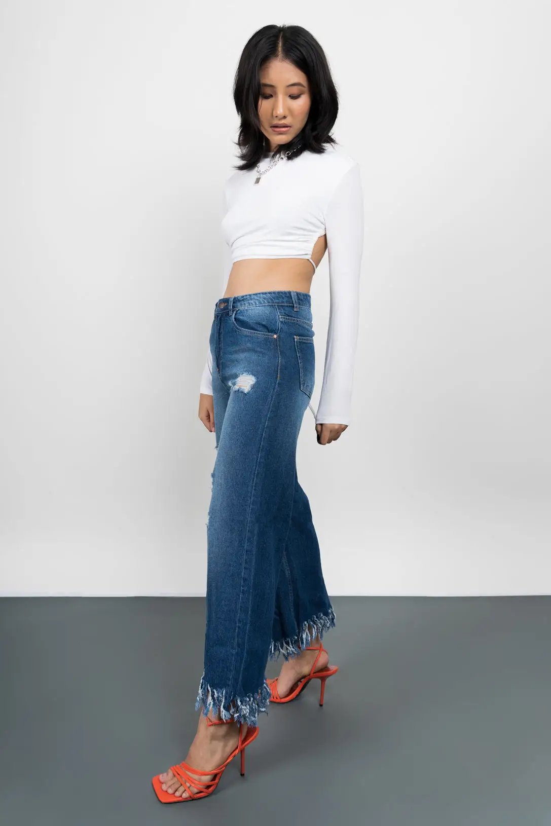ECO-WASHED FLARE JEANS WITH DISTRESS