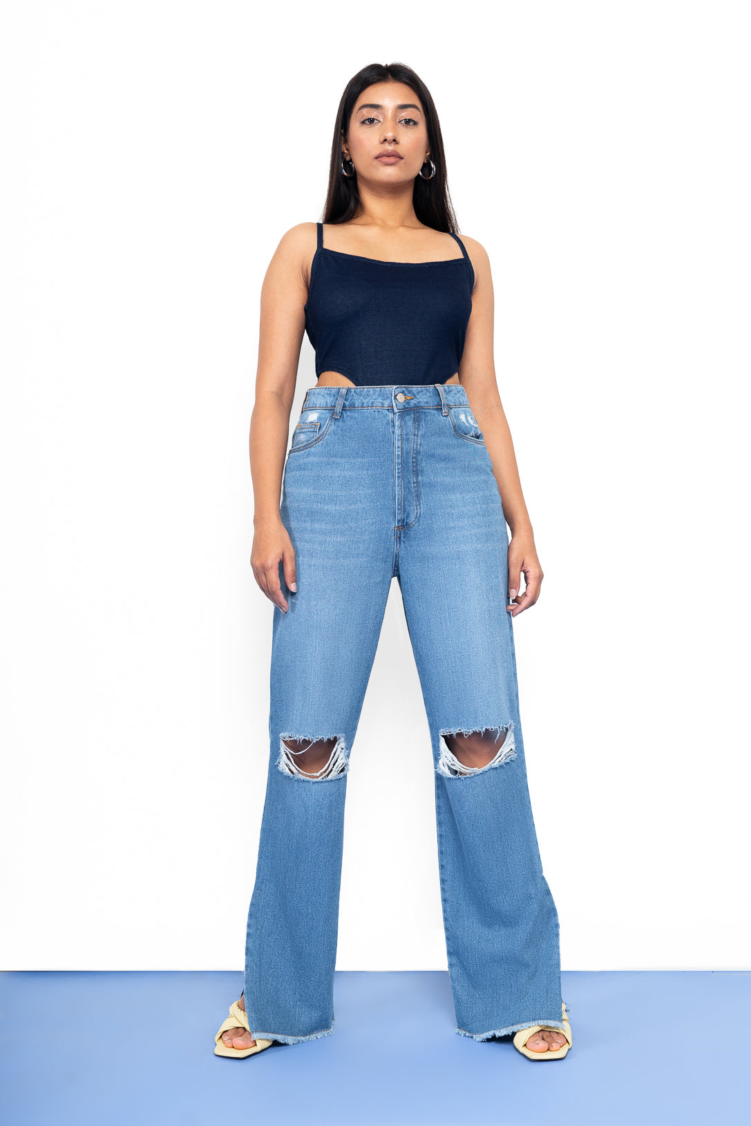 Distressed straight fit slit jeans