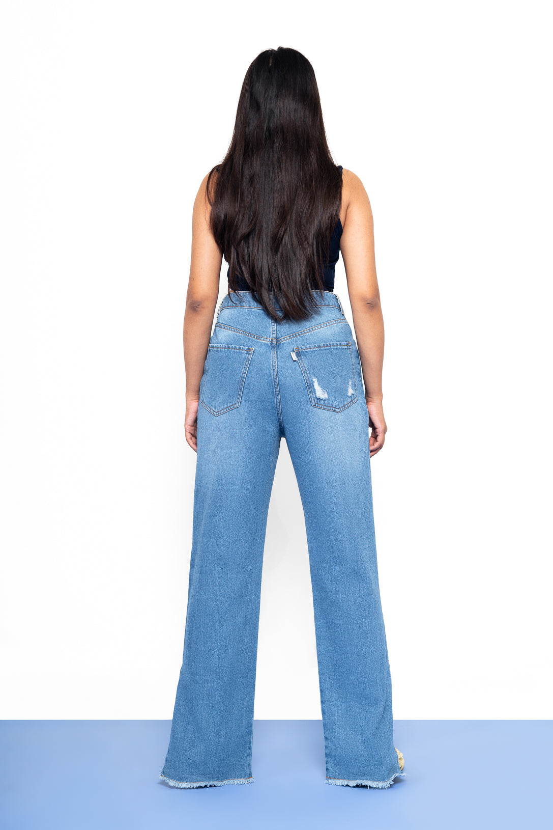 Distressed straight fit slit jeans